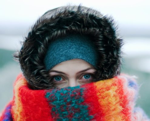 woman in the snow bundled